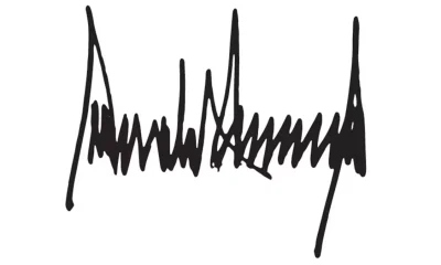 Donald Trump firma