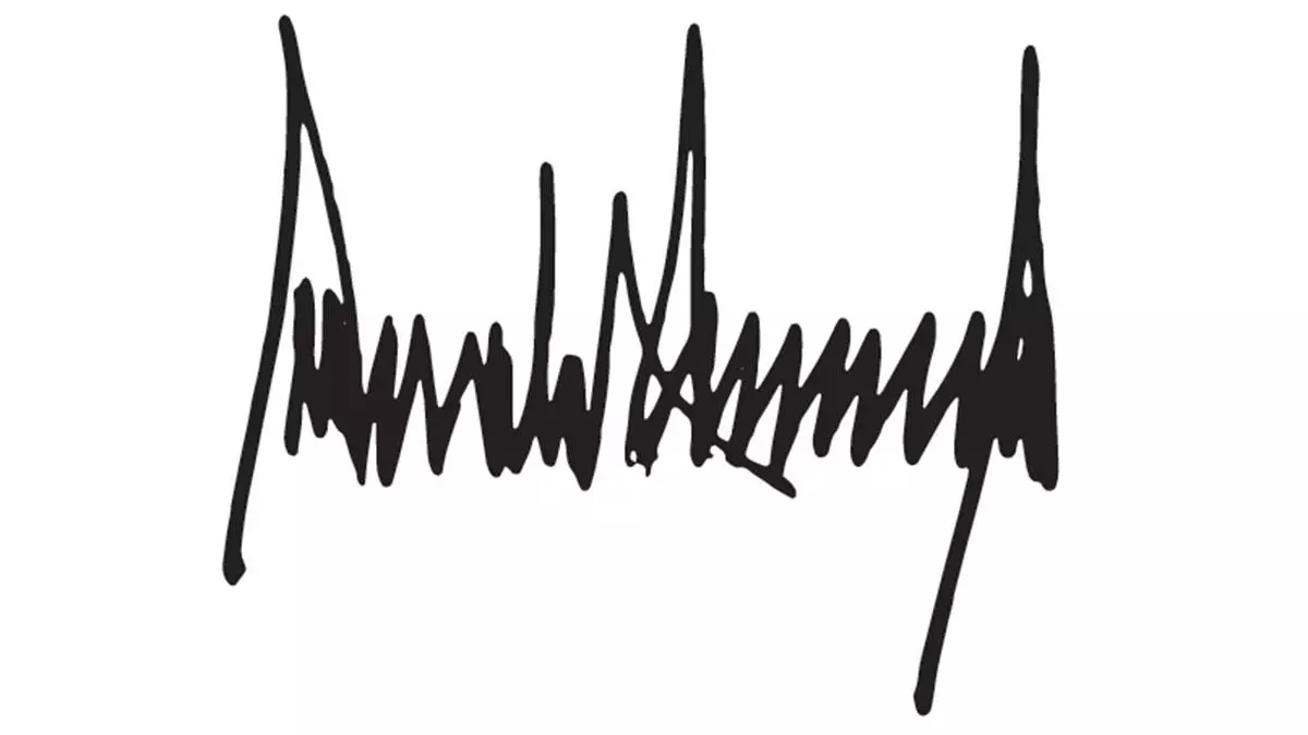 Donald Trump firma